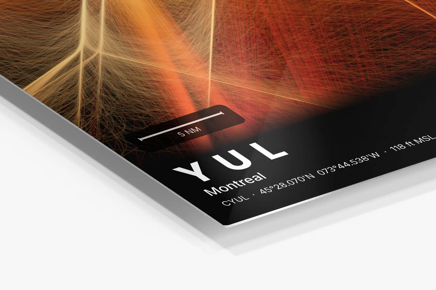 Close-up of the aluminum print's edge and high-gloss finish