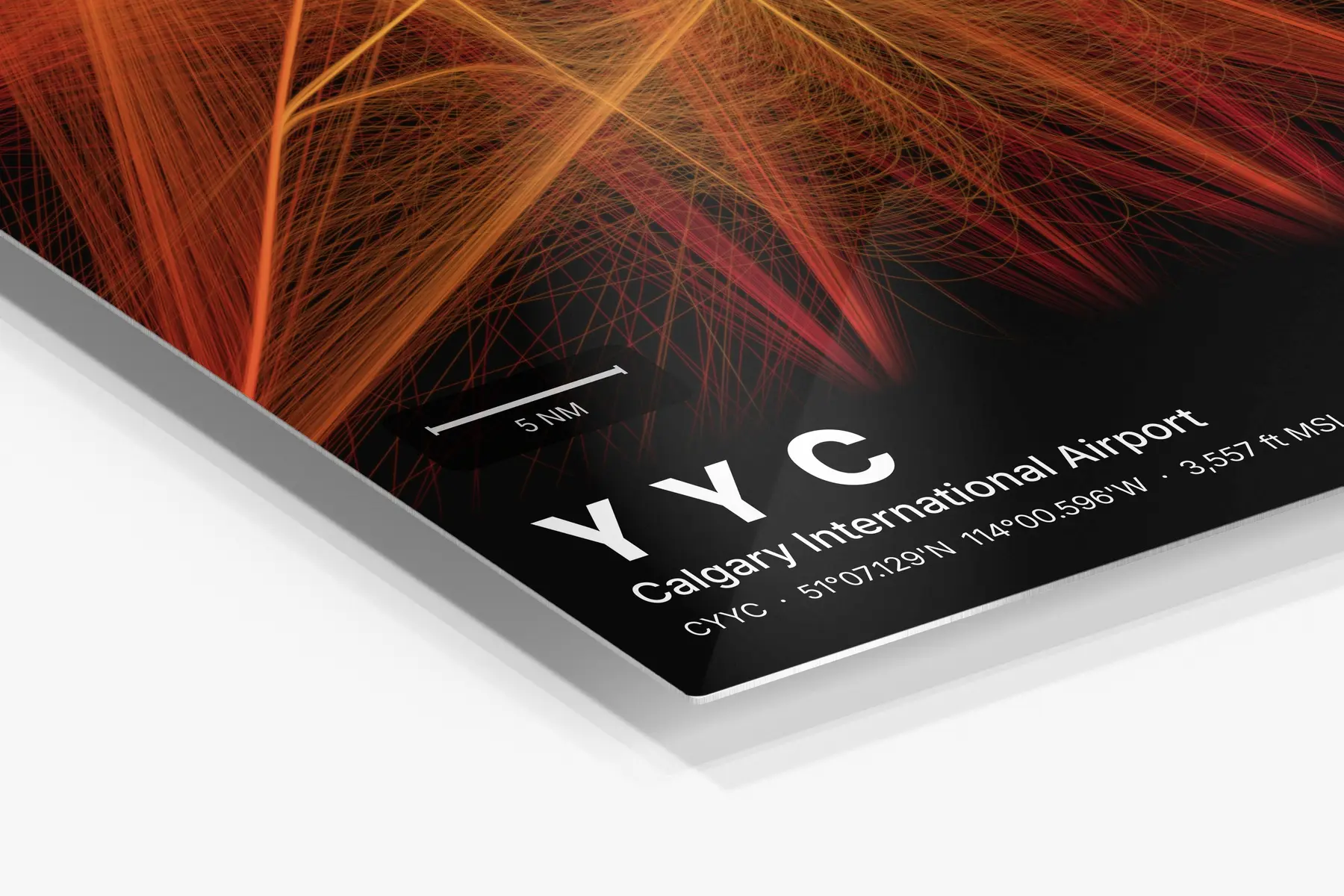Close-up of the aluminum print's edge and high-gloss finish