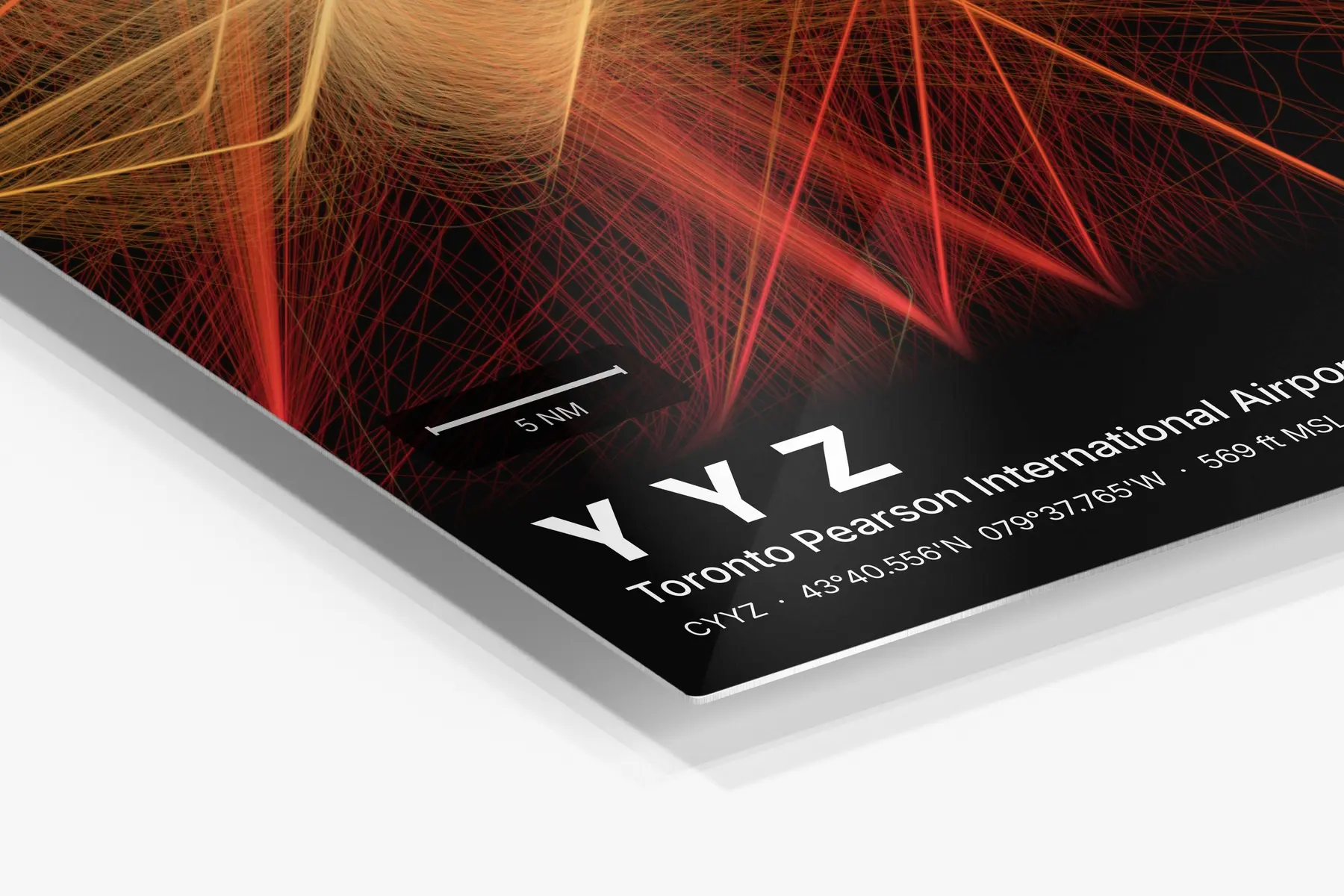 Close-up of the aluminum print's edge and high-gloss finish