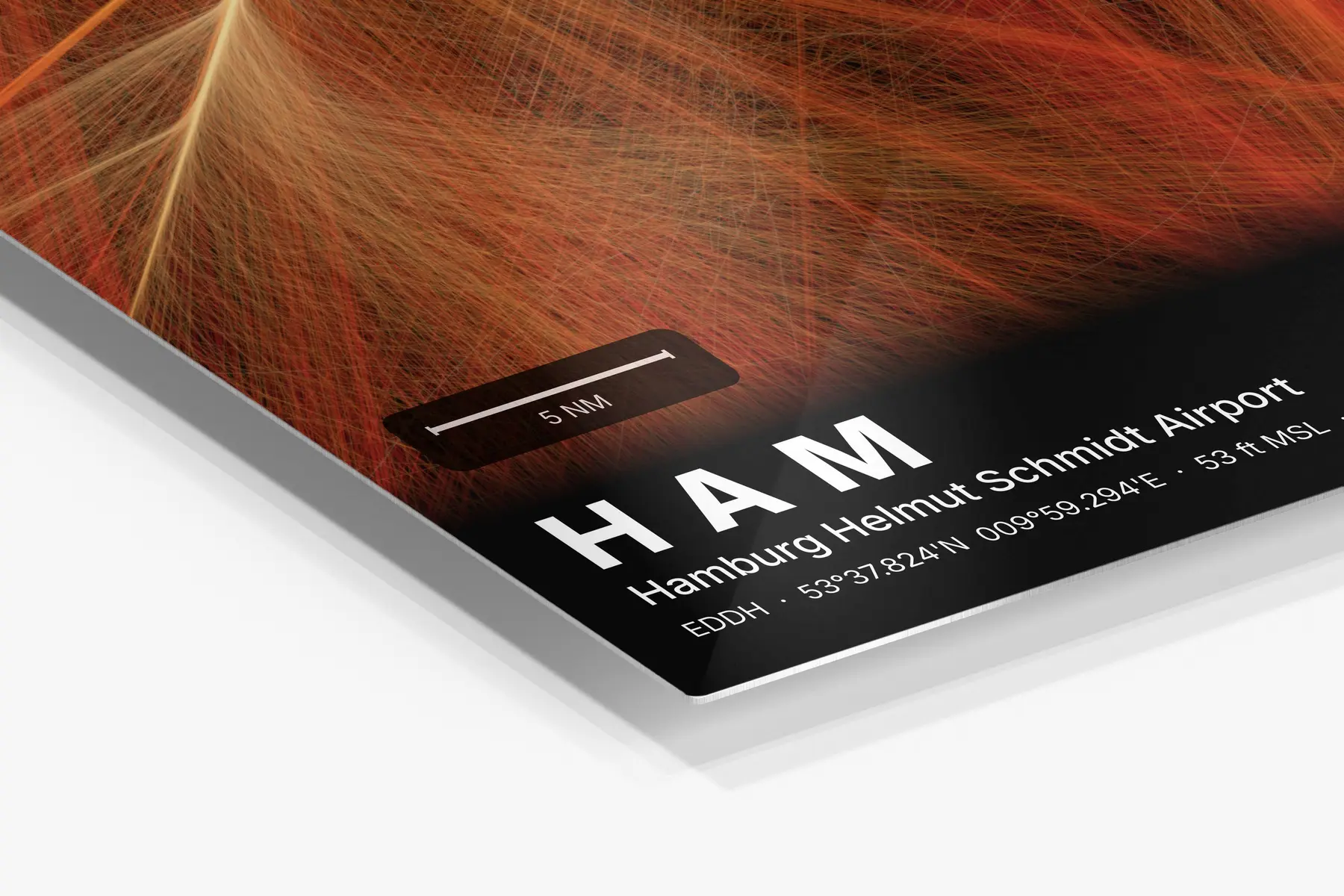 Close-up of the aluminum print's edge and high-gloss finish