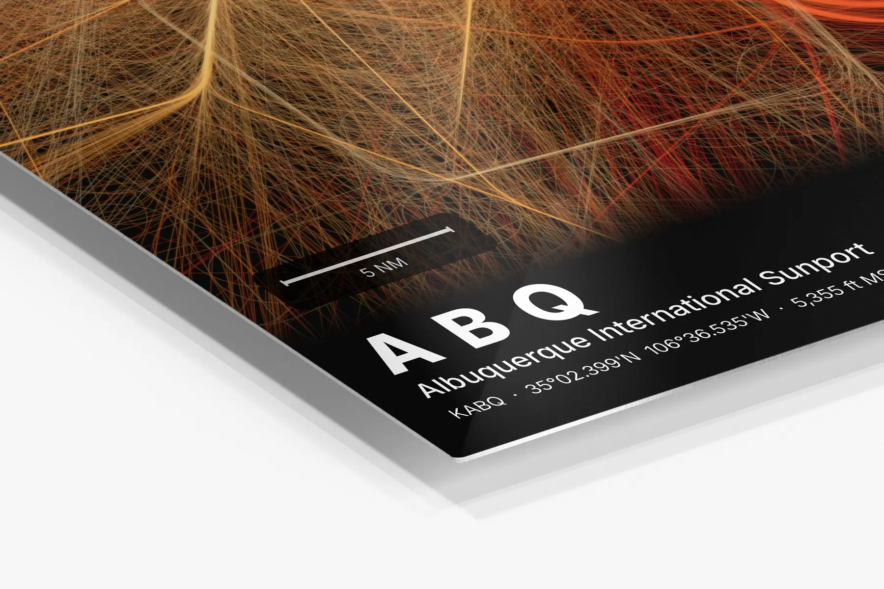 Close-up of the aluminum print's edge and high-gloss finish