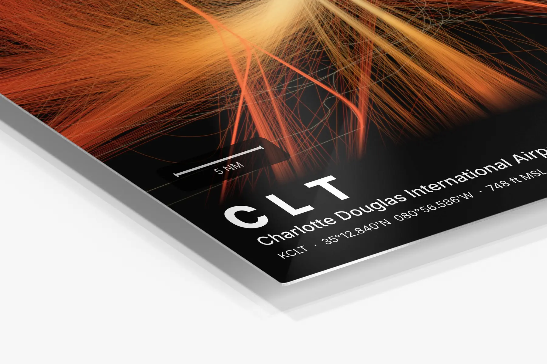 Close-up of the aluminum print's edge and high-gloss finish