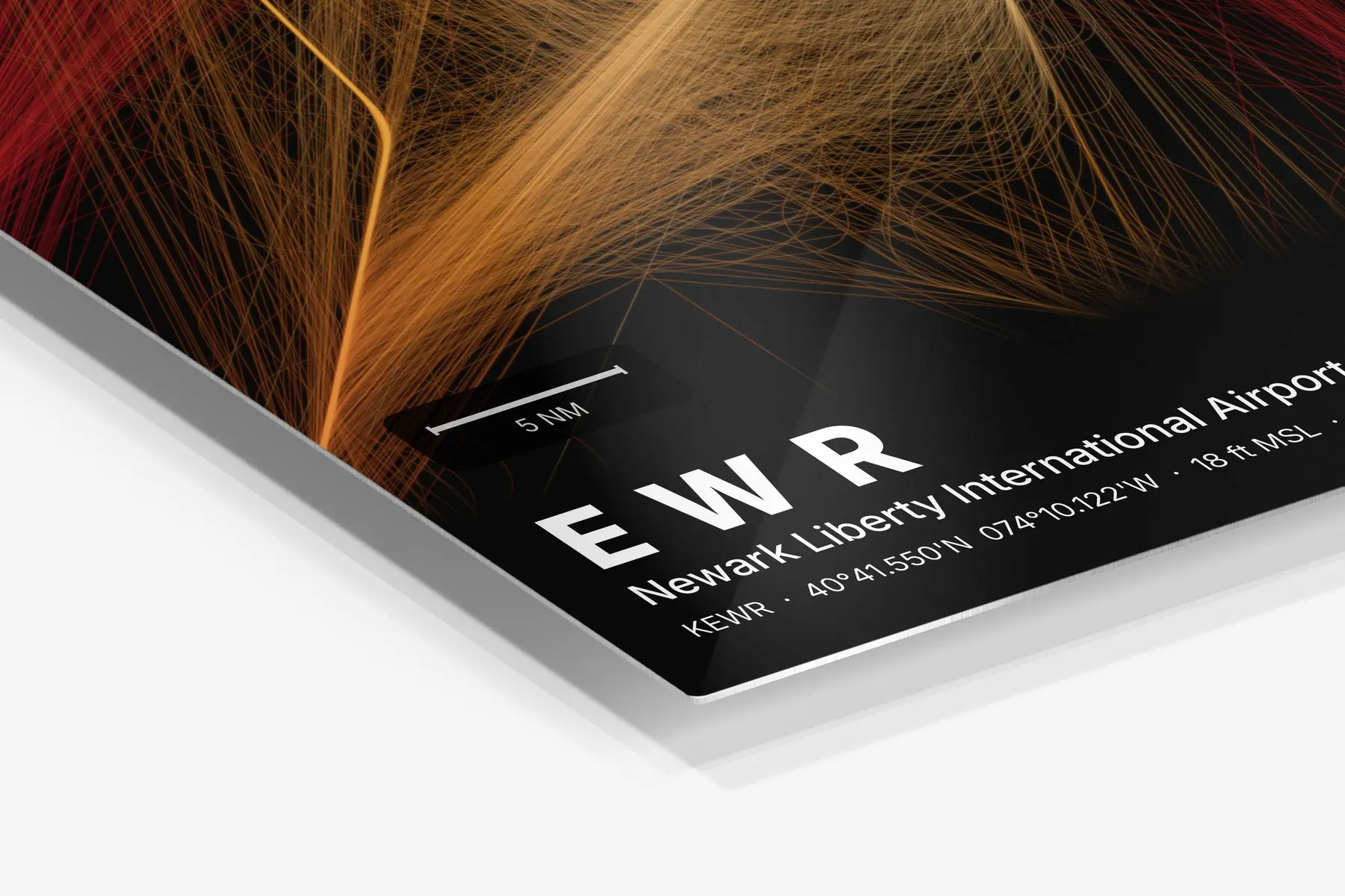 Close-up of the aluminum print's edge and high-gloss finish