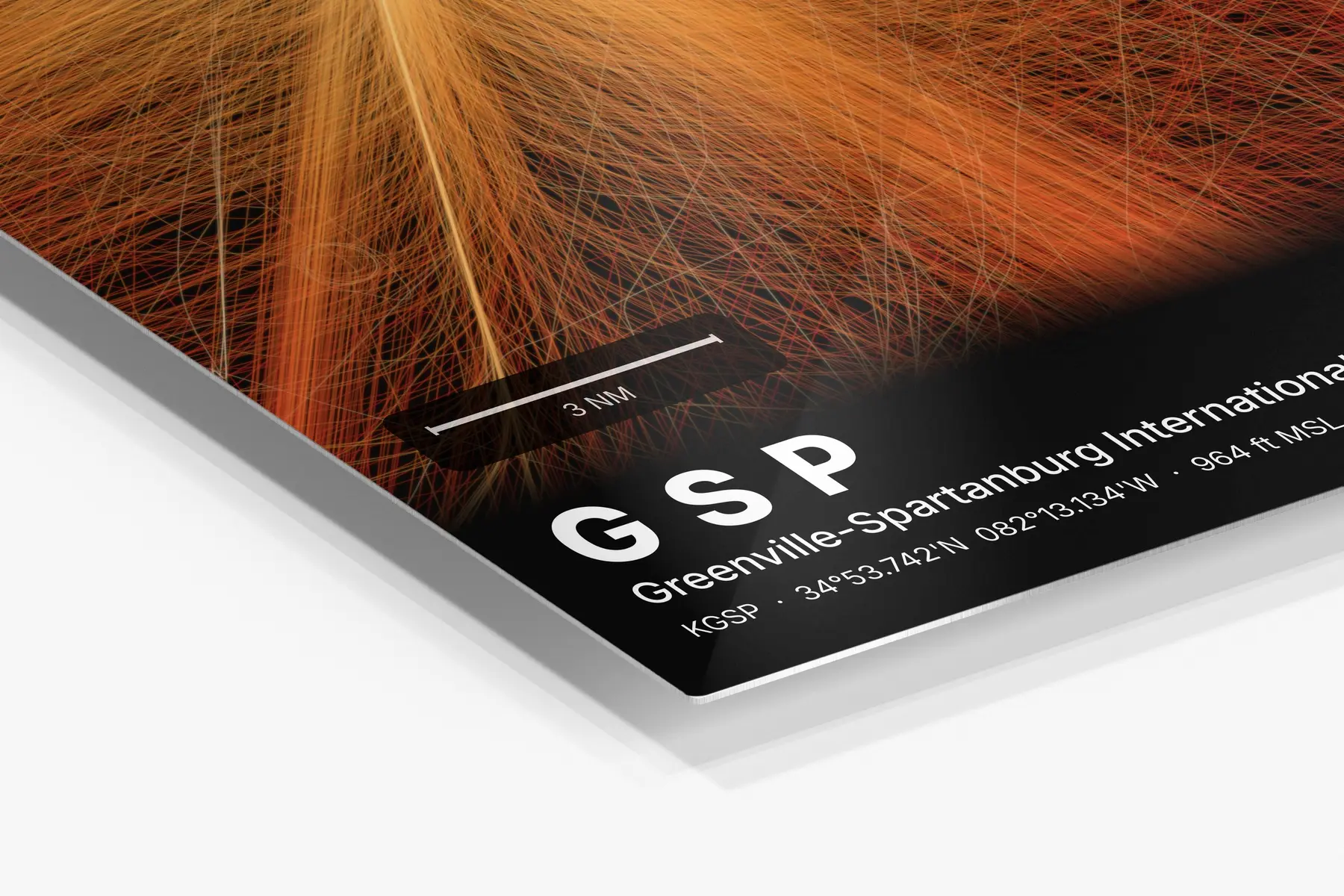 Close-up of the aluminum print's edge and high-gloss finish
