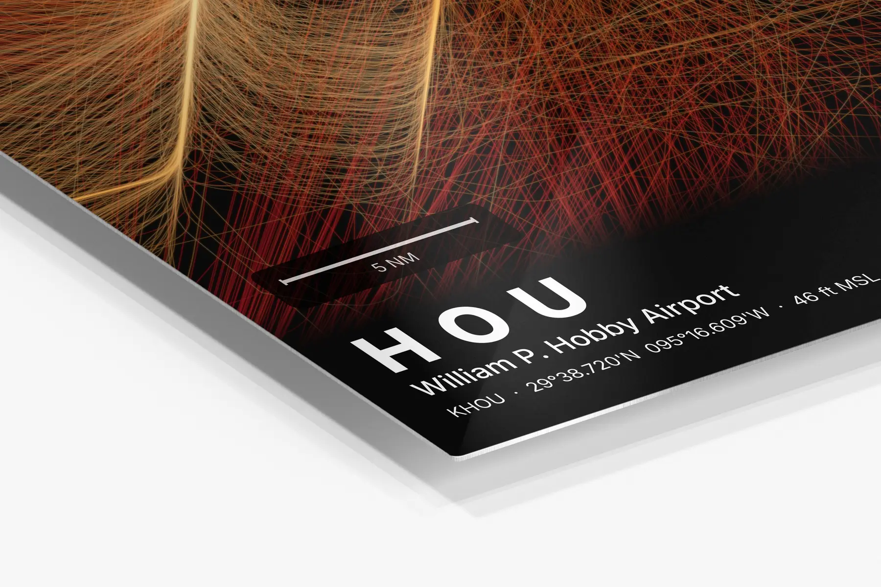 Close-up of the aluminum print's edge and high-gloss finish