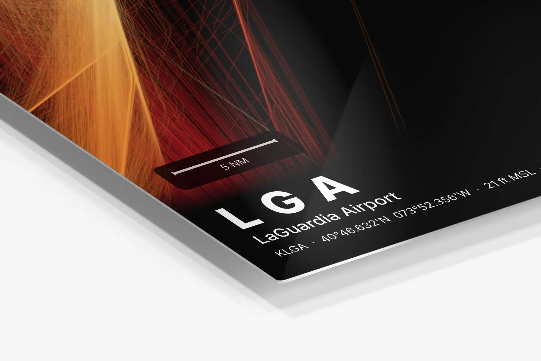Close-up of the aluminum print's edge and high-gloss finish