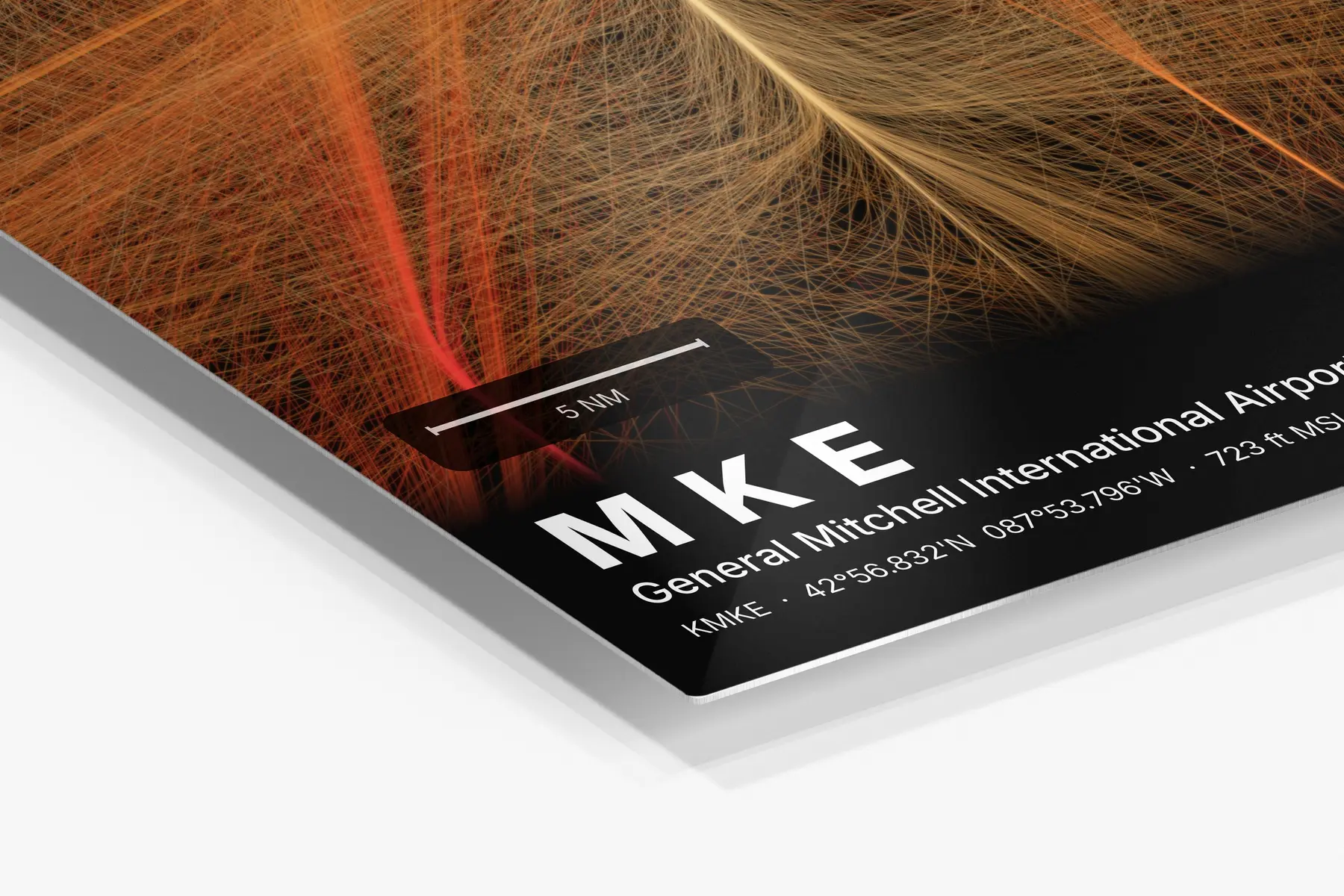 Close-up of the aluminum print's edge and high-gloss finish