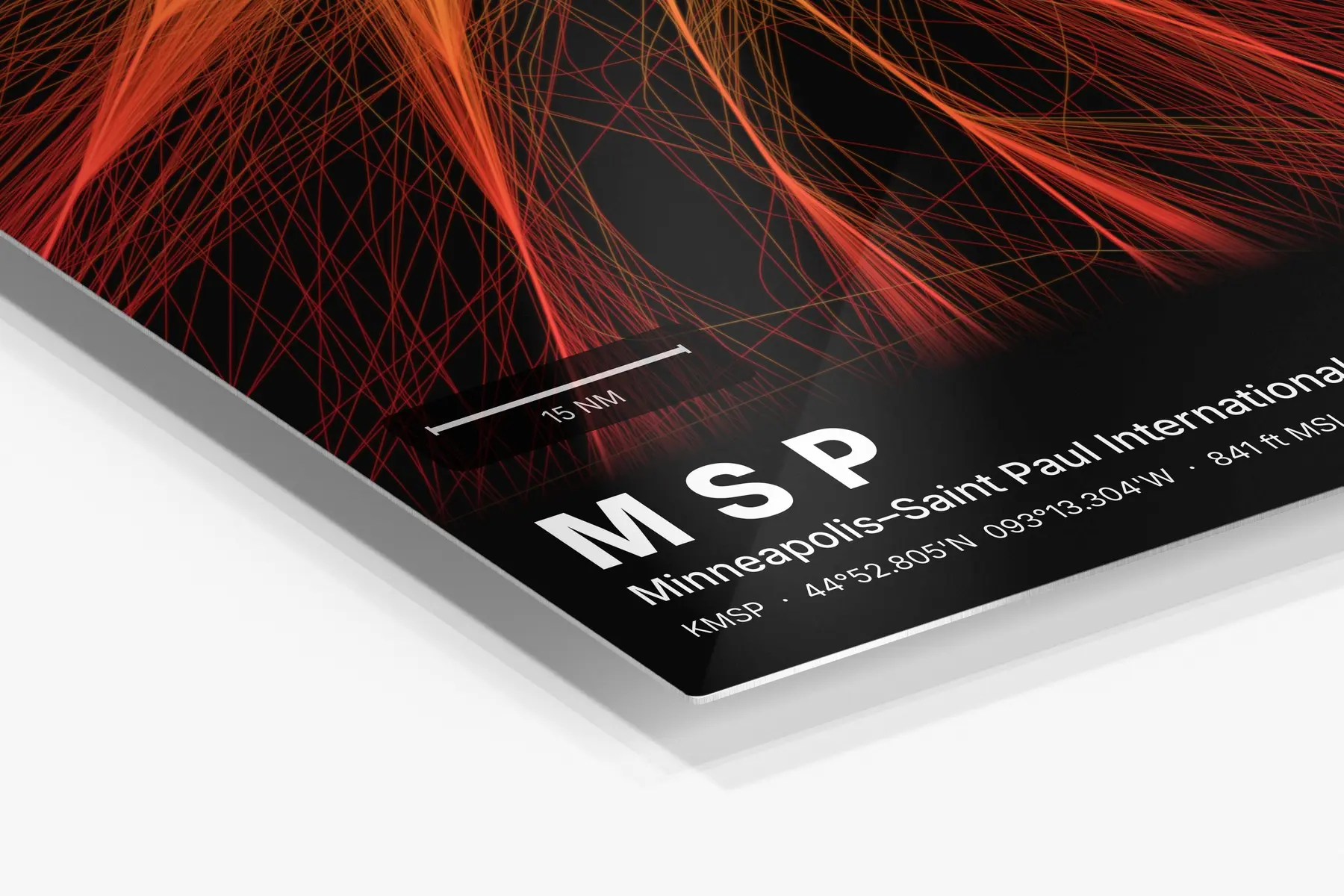 Close-up of the aluminum print's edge and high-gloss finish