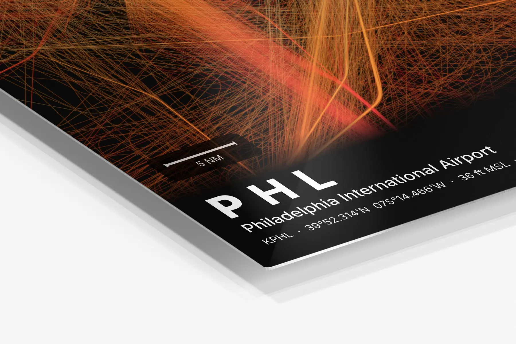 Close-up of the aluminum print's edge and high-gloss finish