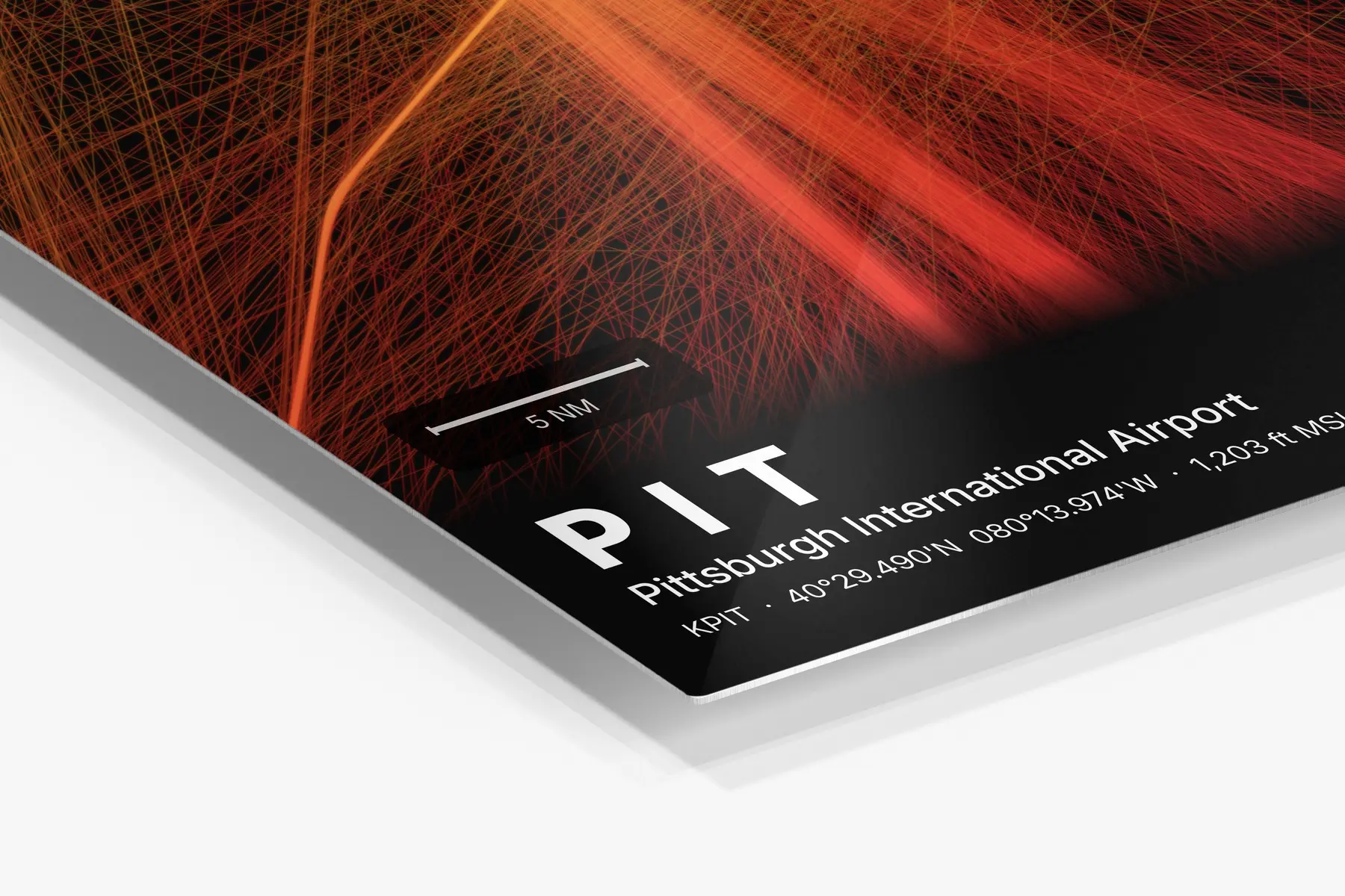 Close-up of the aluminum print's edge and high-gloss finish