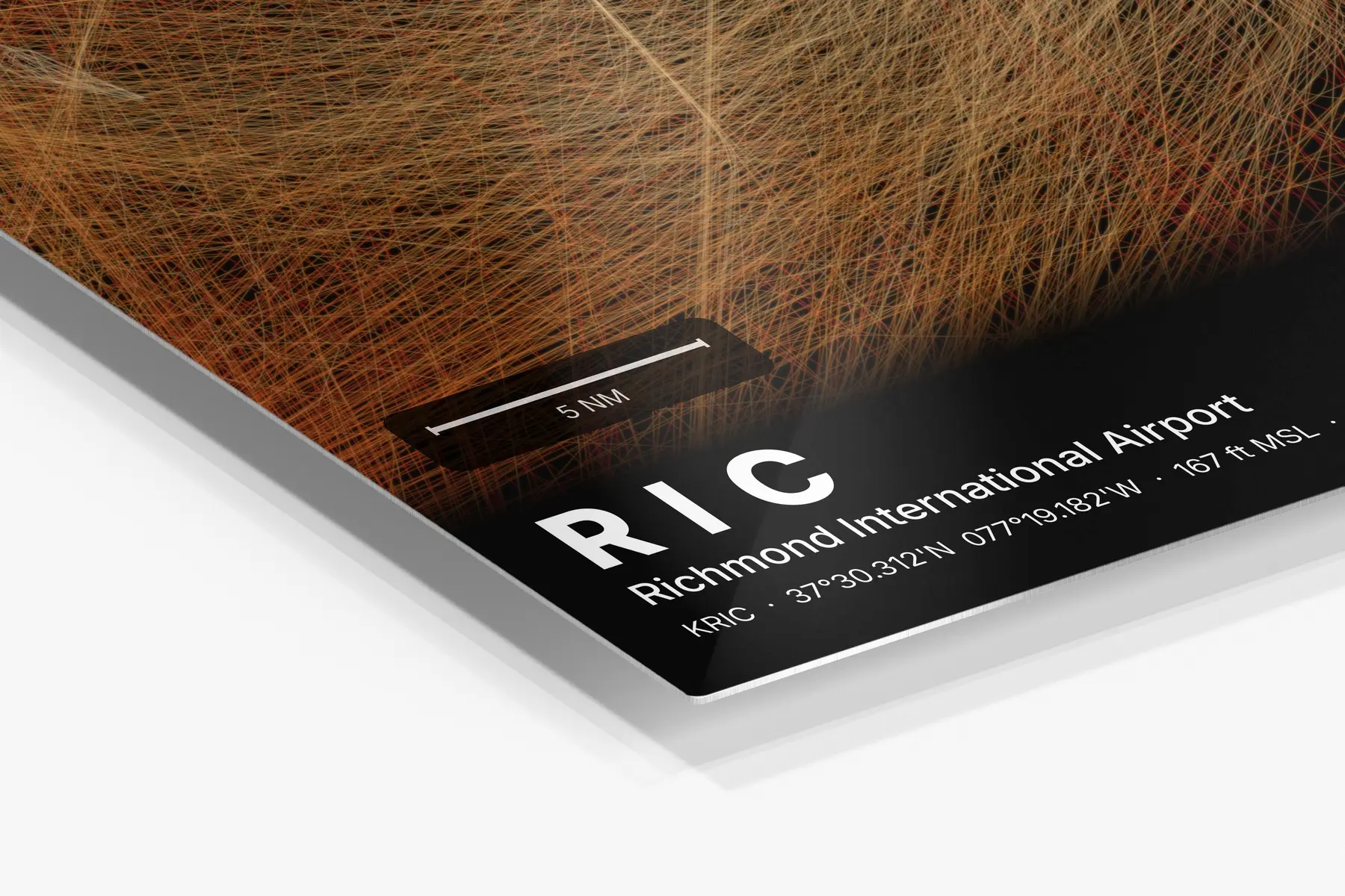 Close-up of the aluminum print's edge and high-gloss finish