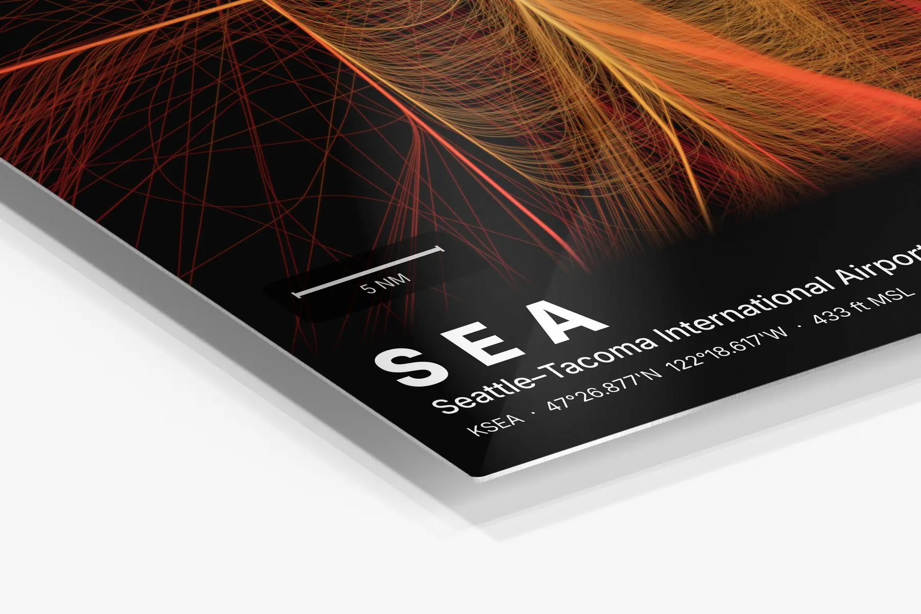 Close-up of the aluminum print's edge and high-gloss finish