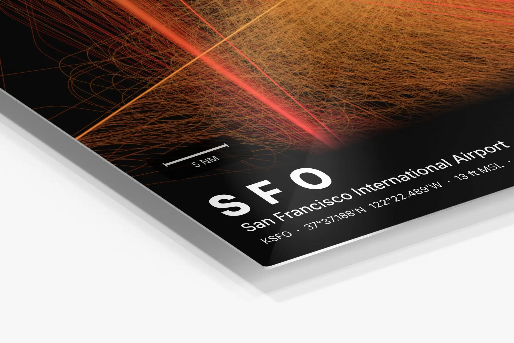 Close-up of the aluminum print's edge and high-gloss finish