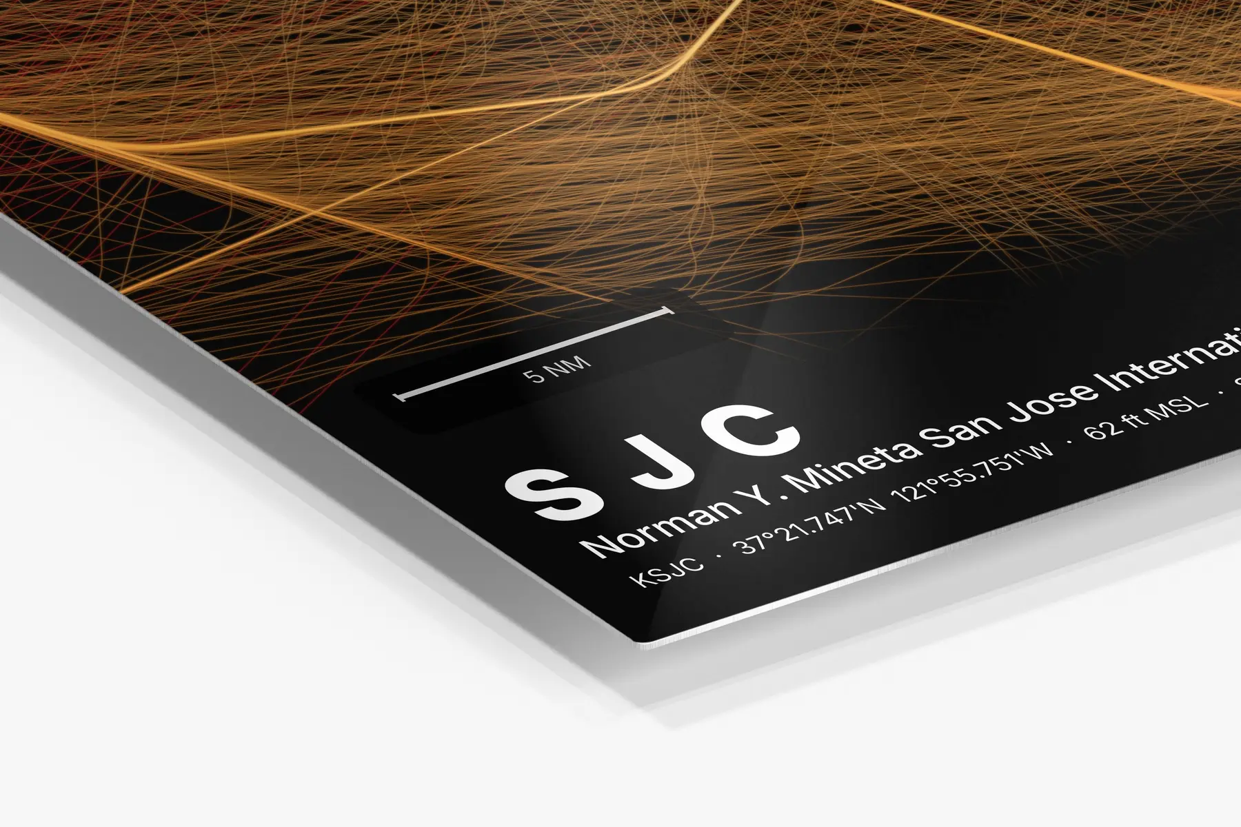 Close-up of the aluminum print's edge and high-gloss finish