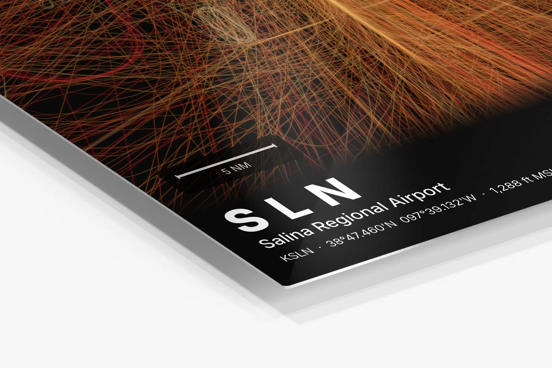 Close-up of the aluminum print's edge and high-gloss finish