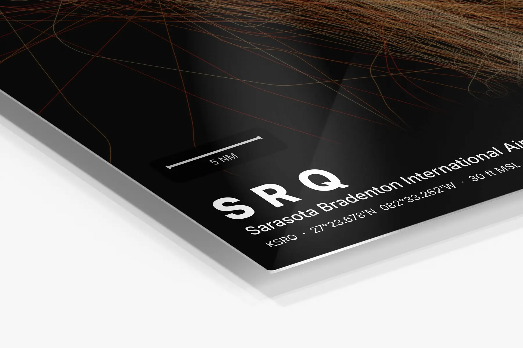 Close-up of the aluminum print's edge and high-gloss finish