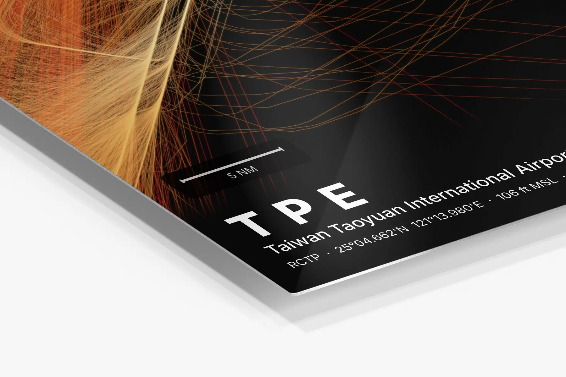 Close-up of the aluminum print's edge and high-gloss finish
