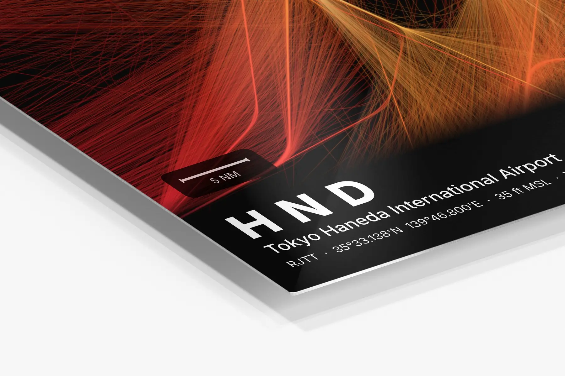 Close-up of the aluminum print's edge and high-gloss finish