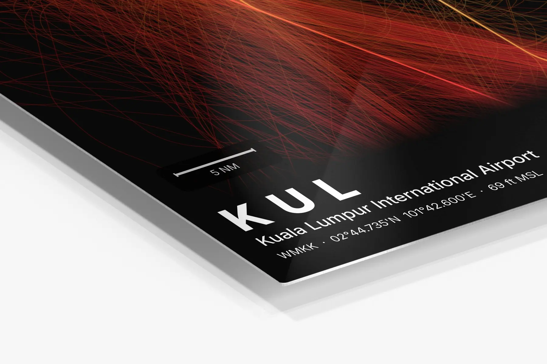 Close-up of the aluminum print's edge and high-gloss finish