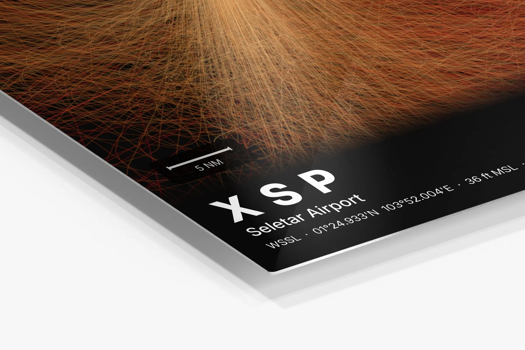 Close-up of the aluminum print's edge and high-gloss finish