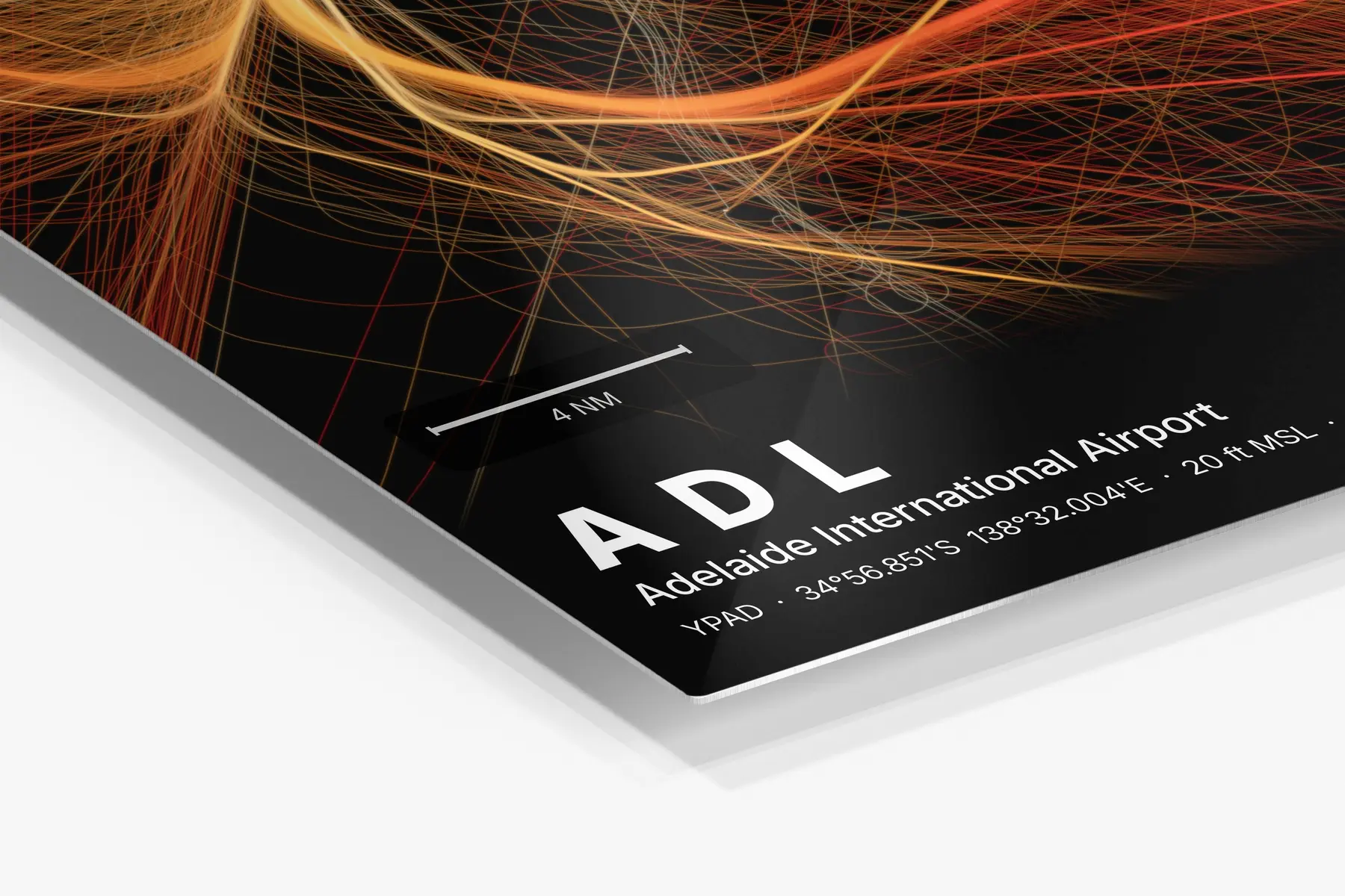 Close-up of the aluminum print's edge and high-gloss finish