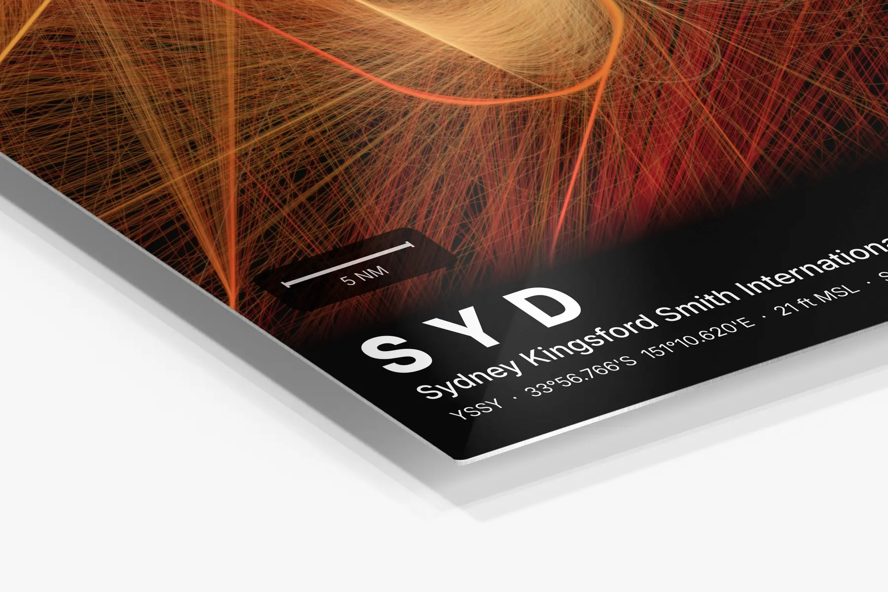 Close-up of the aluminum print's edge and high-gloss finish